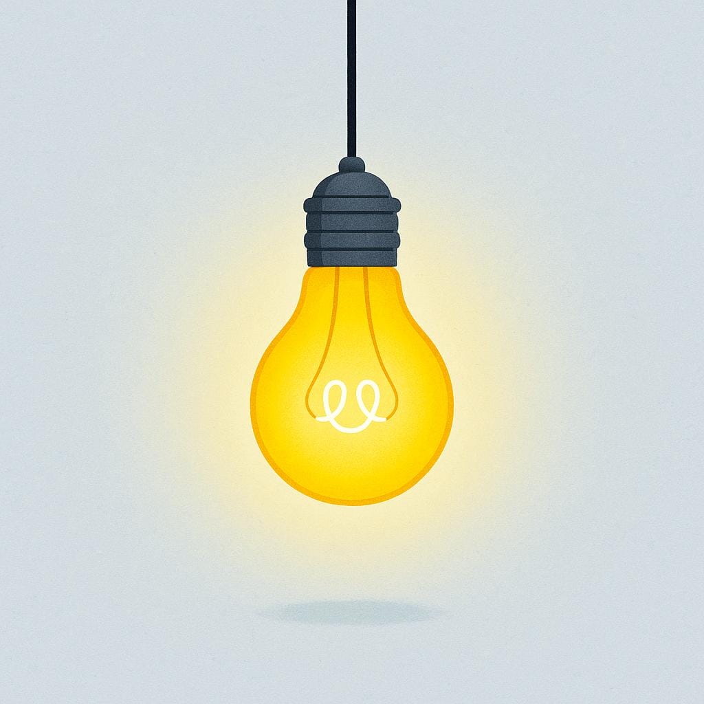 A bright, glowing yellow light bulb hanging from a cord against a dark background, indicating it is illuminated.