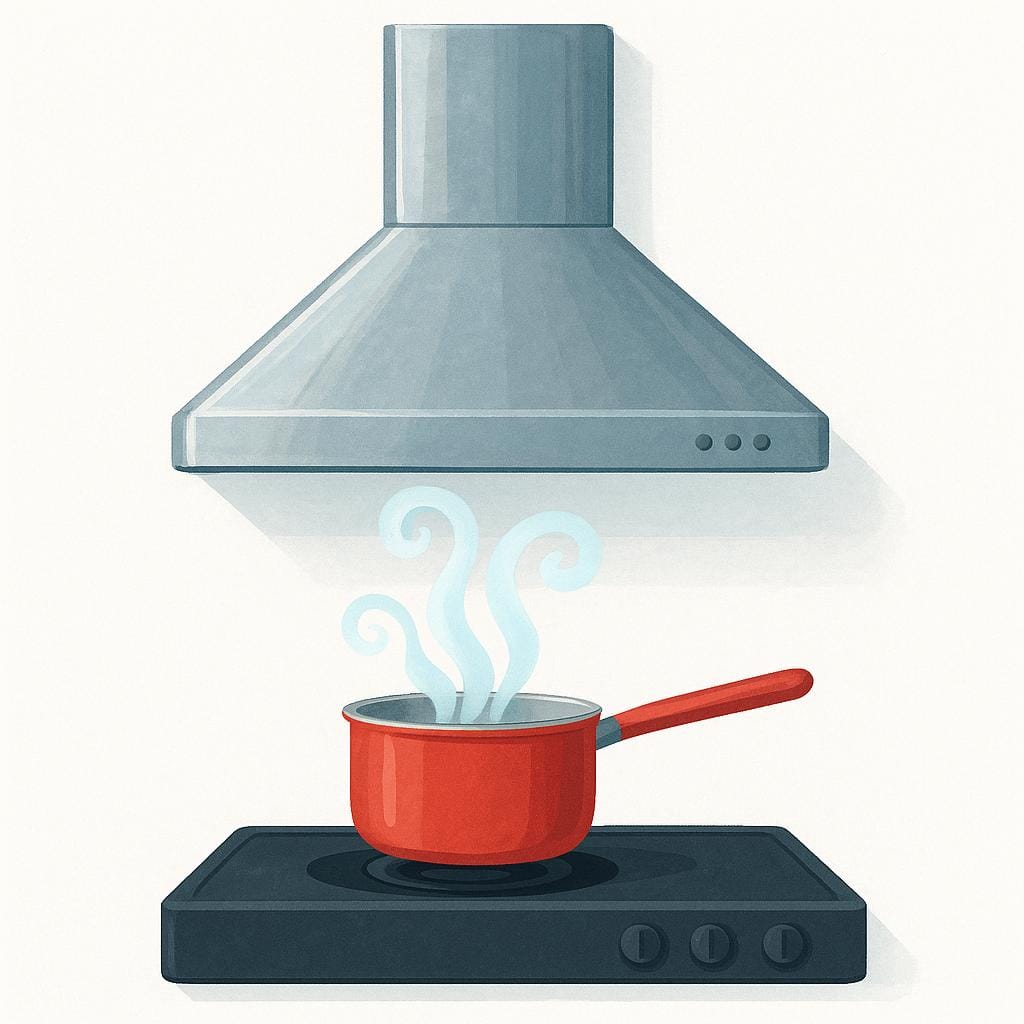 A metallic kitchen extractor hood mounted on a white wall above a simple black stovetop.