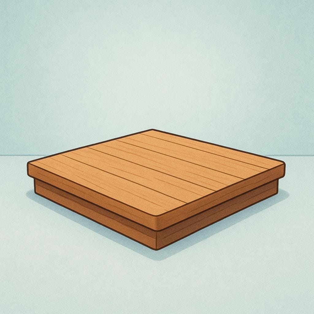 A simple, empty square wooden platform or stage illuminated by a soft light, ready for a speaker or performer.