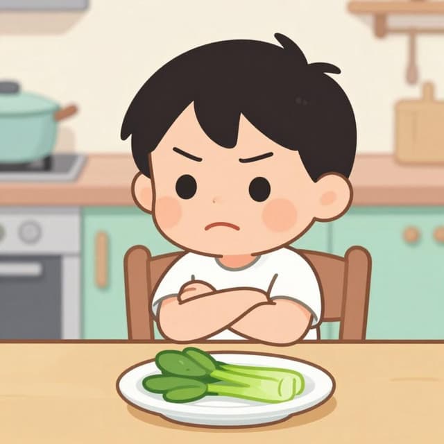 A child crossing their arms with a pouty expression in front of a bowl of broccoli.