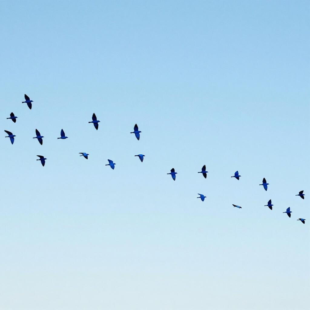 A vast flock of small blue birds flying together across a clear sky.