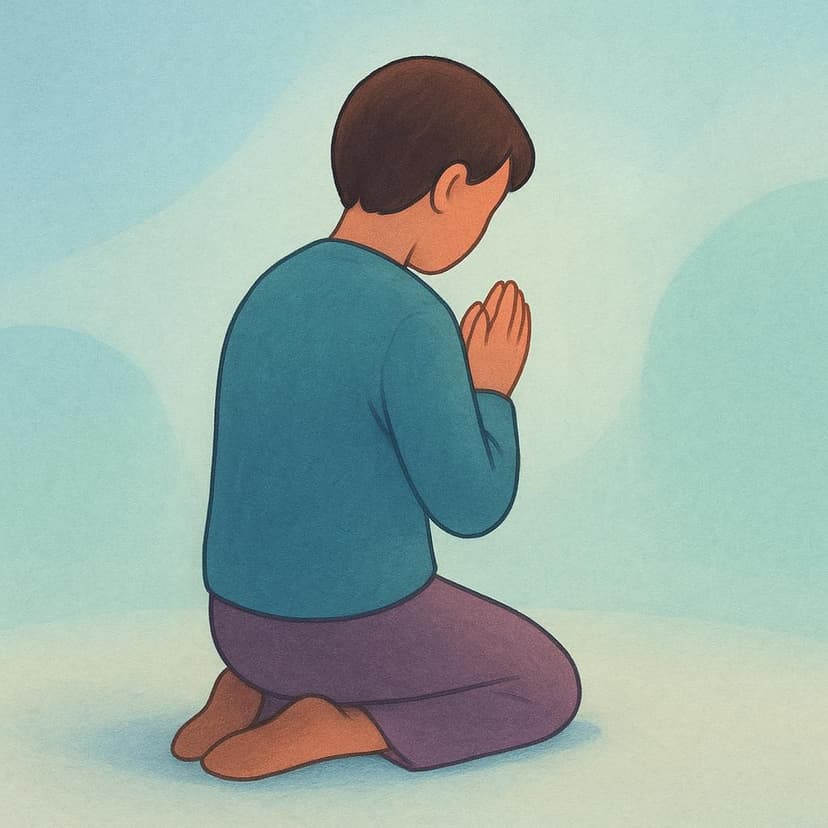 A solitary figure kneeling down with their hands clasped together in the universal gesture of prayer.