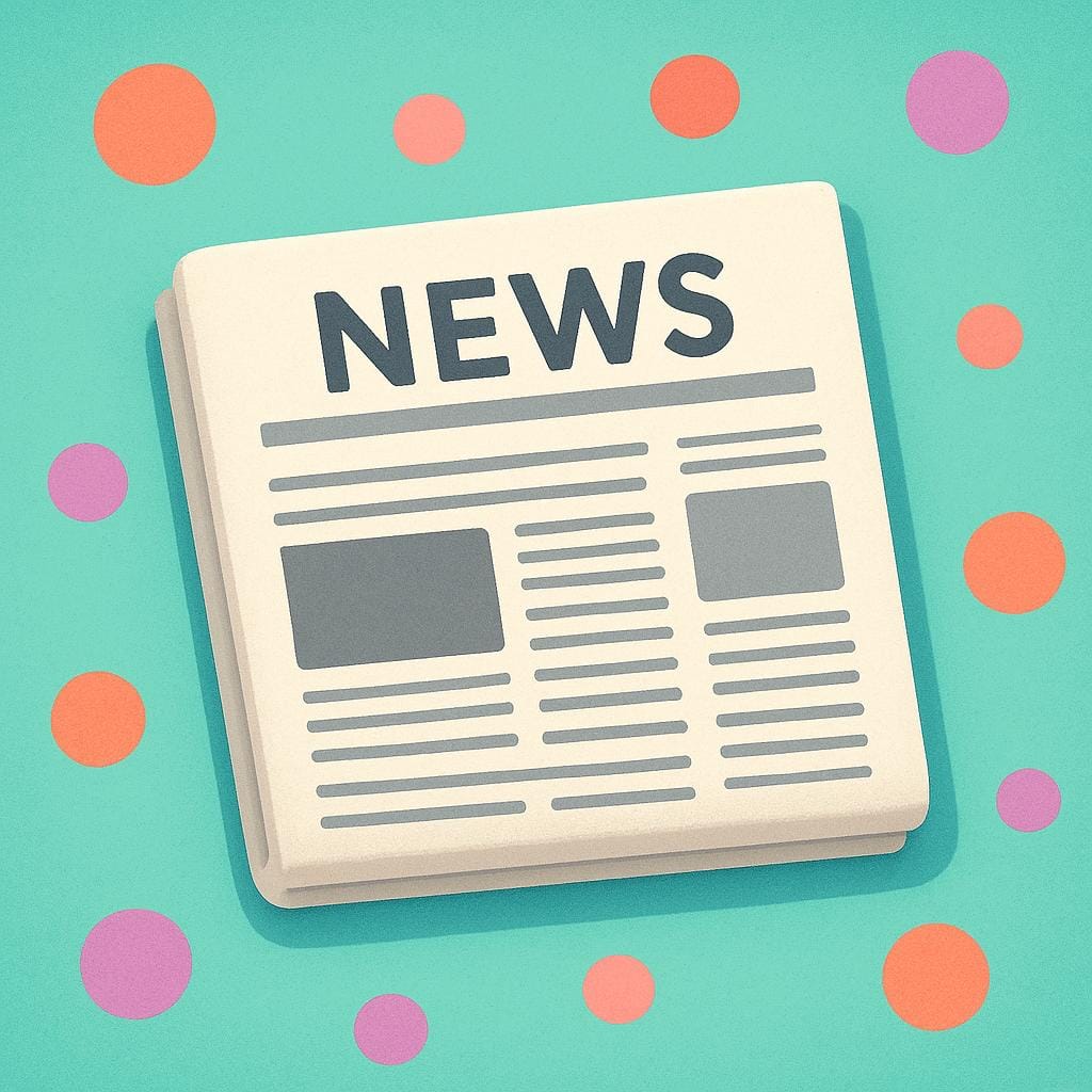 A neatly folded newspaper lying flat on a colorful surface, without any visible text.